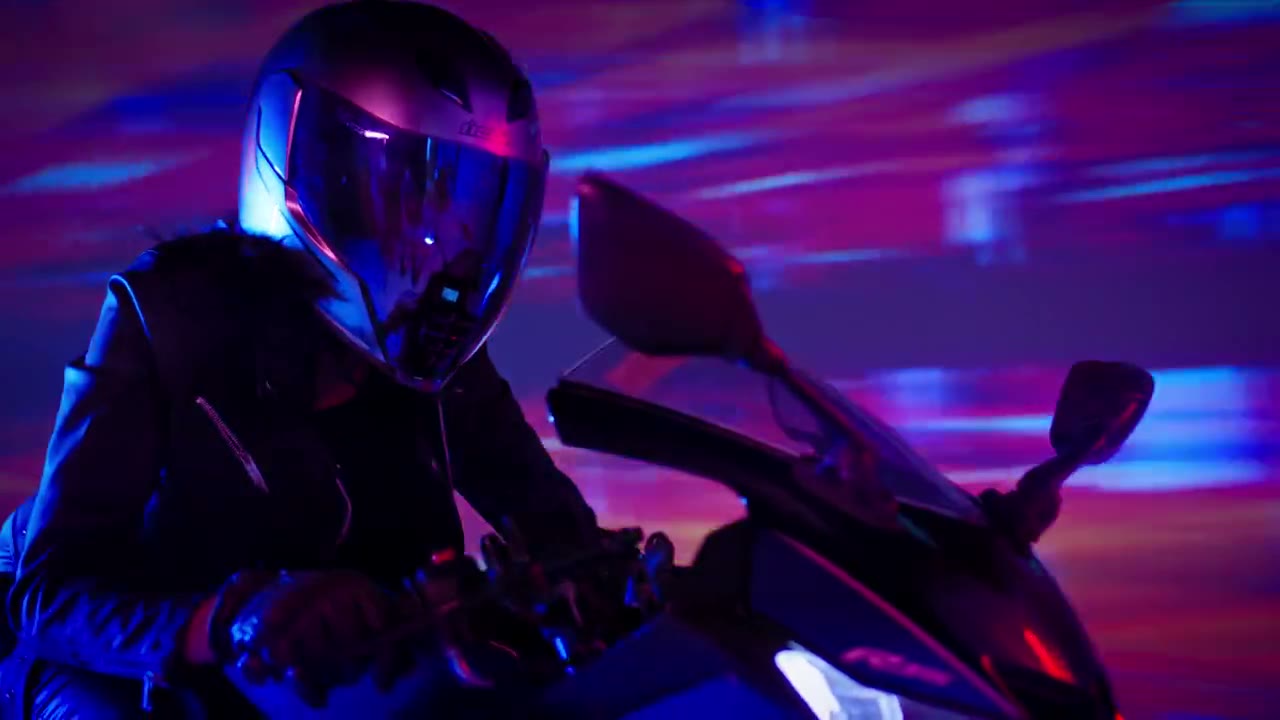 Reference frame from a neon cinematic riding video